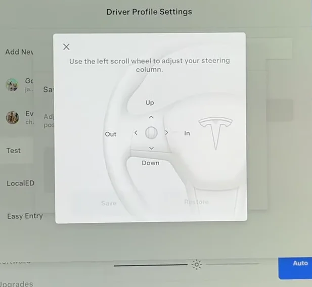 Tesla steering wheel adjusted to its highest and closest position to the dashboard to clear space and facilitate easier access.