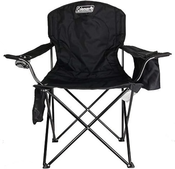 Coleman camp chair set up for relaxation around a fire pit, ideal for camping comfort.