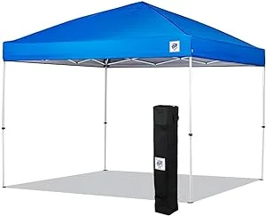 Easy-up canopy set up at an RV site, providing shade and protection from the elements.