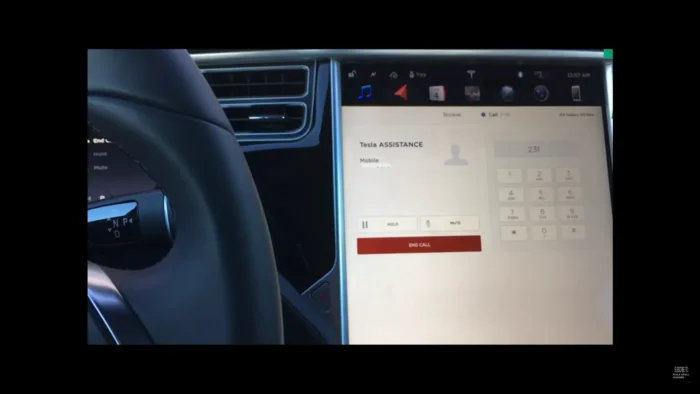 Contacting the Tesla Service Center for assistance through the media screen of the Tesla