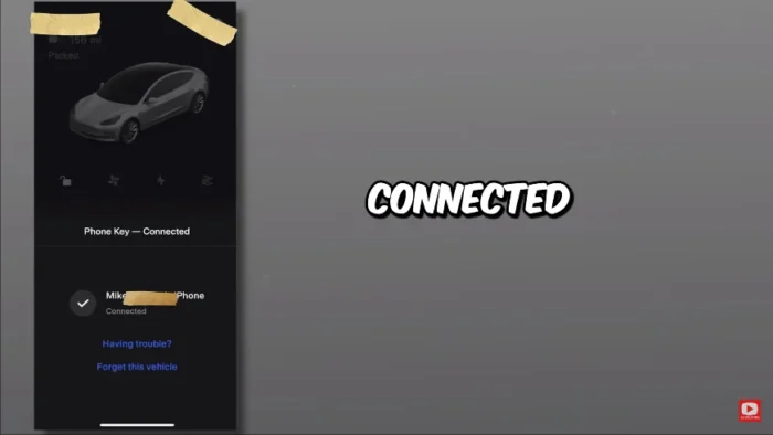 Tesla touchscreen displaying 'Phone Key Connected' message
