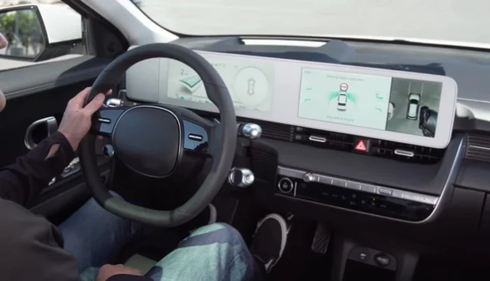 a man using car parking assist on hyundai ioniq 5