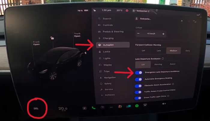 Tesla touchscreen showing how to enable or disable Emergency Lane Departure Avoidance by navigating to Controls > Autopilot > Emergency Lane Departure Avoidance, with a warning tone and red highlight on the lane marker displayed.