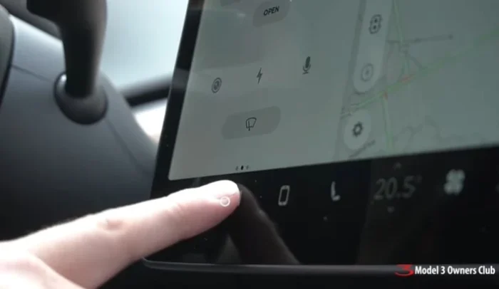 finger press button on media player setting tesla