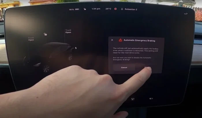 Screenshot of the Tesla touchscreen showing the visual message indicating that Automatic Emergency Braking has been disabled.